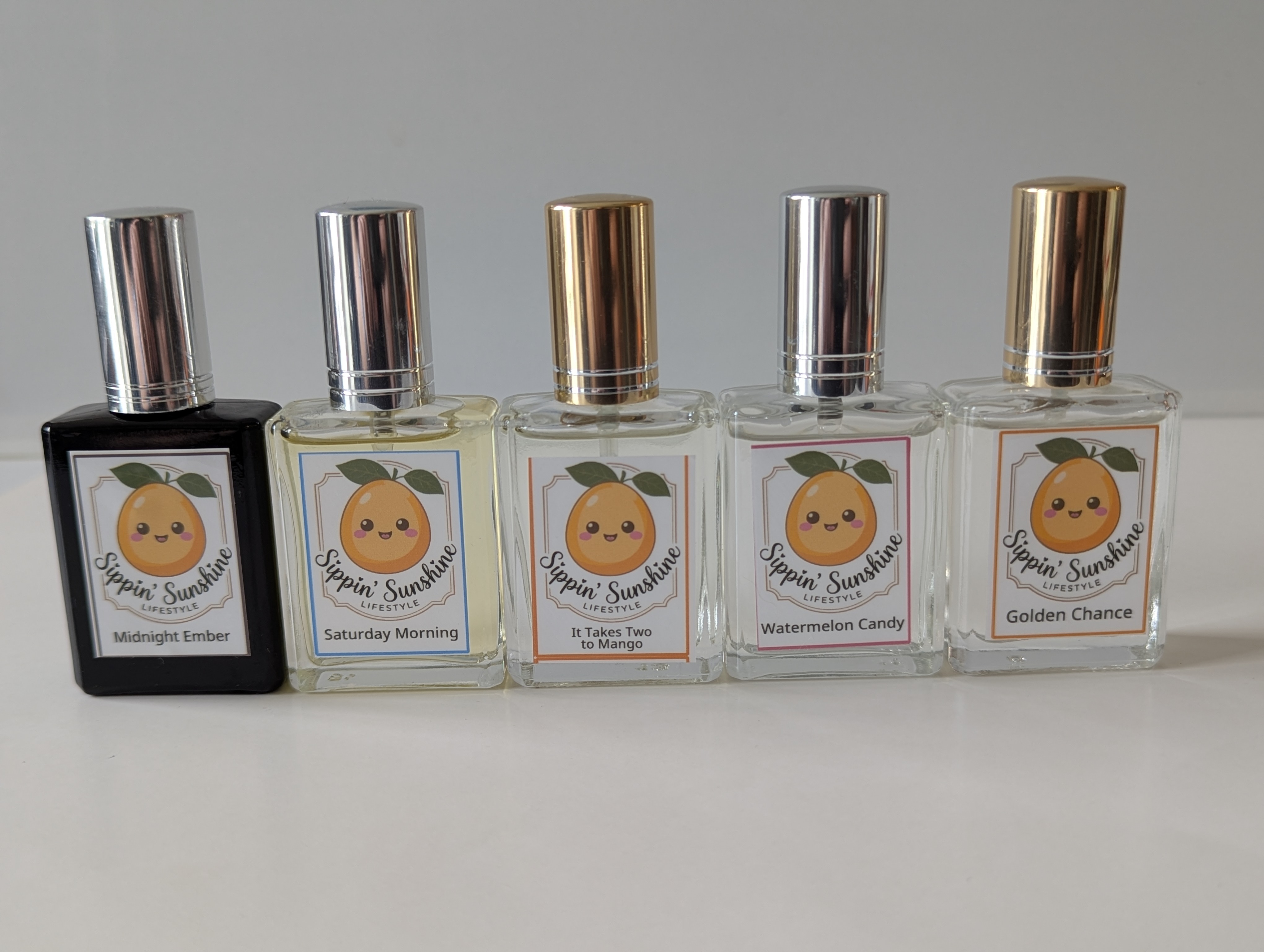 Sippin' Sunshine small-batch perfume and cologne fragrance bottles