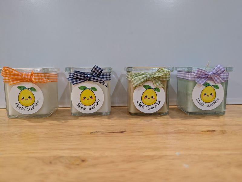 Small handmade tealight candles from Sippin' Sunshine — ideal for party favors